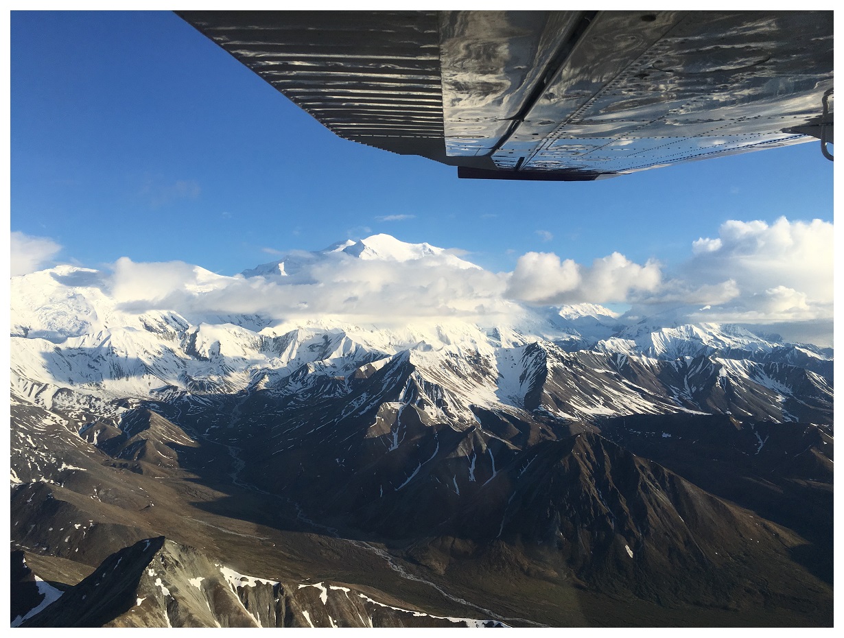 plane aviation mountain sky clouds denali